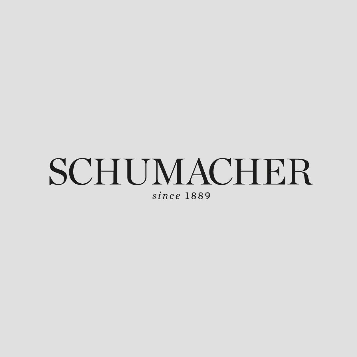 The logo for schumacher since 1889 is on a white background.