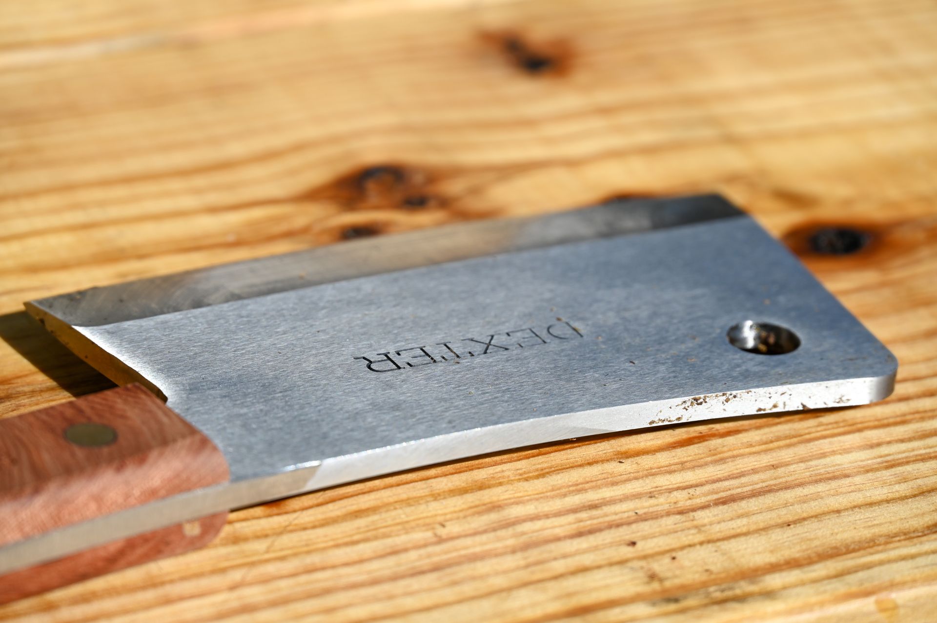 Close up of a BBQ cleaver.