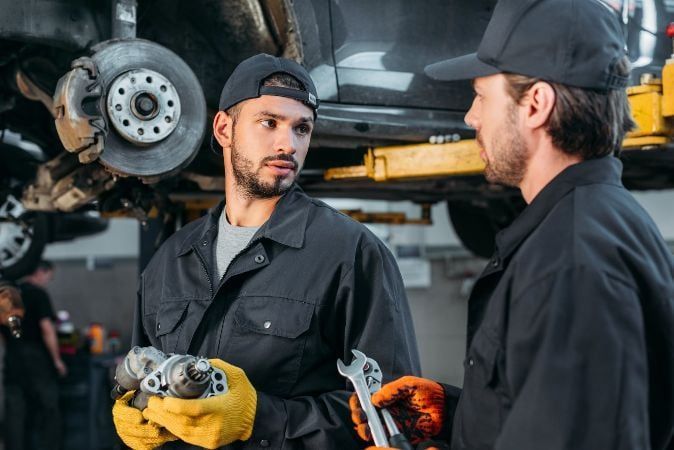 mechanic repairing car mechanic repairing car