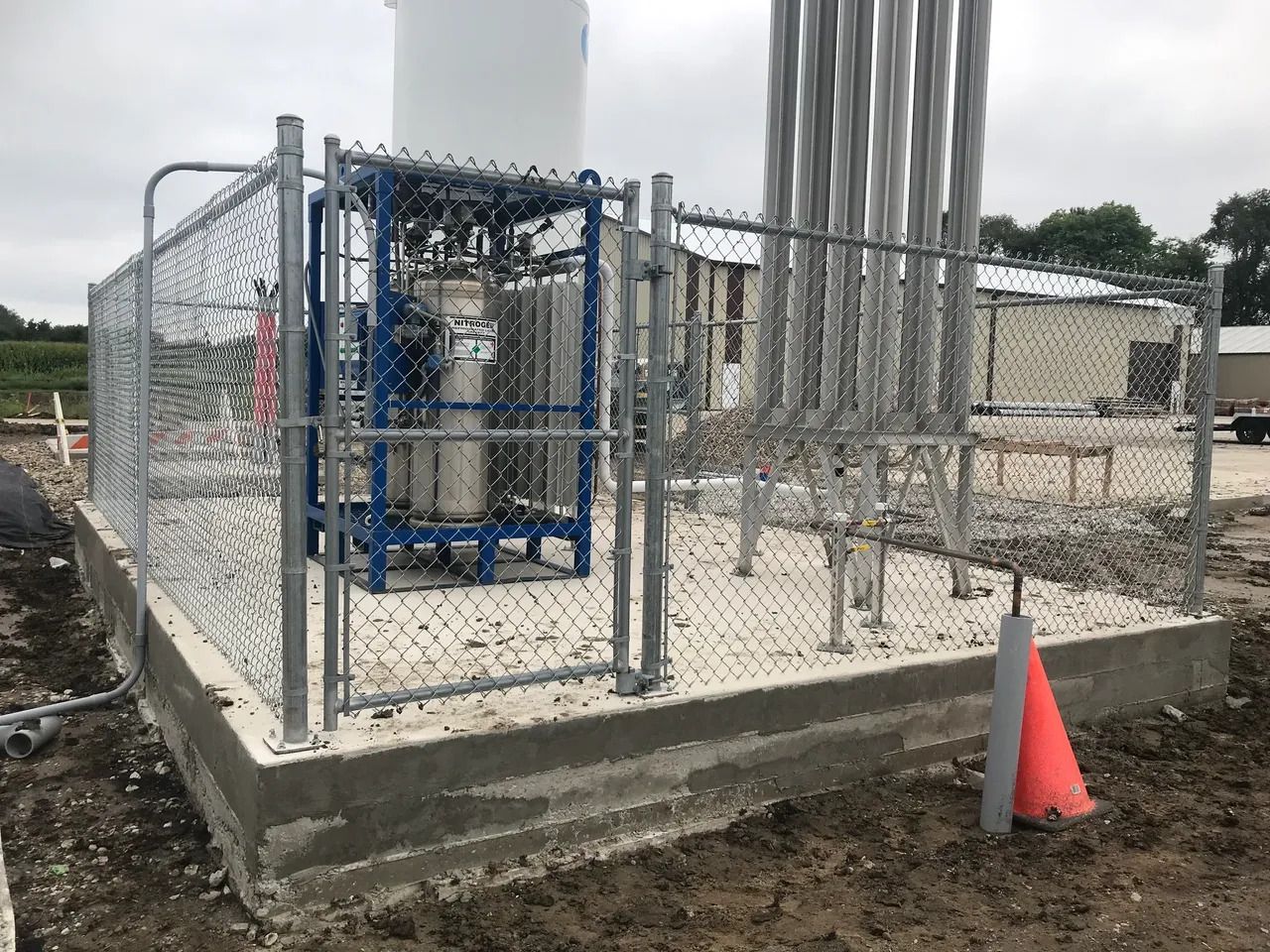 Tanks with Chain Link Fence — Bondurant, IA — Titan Fence LLC