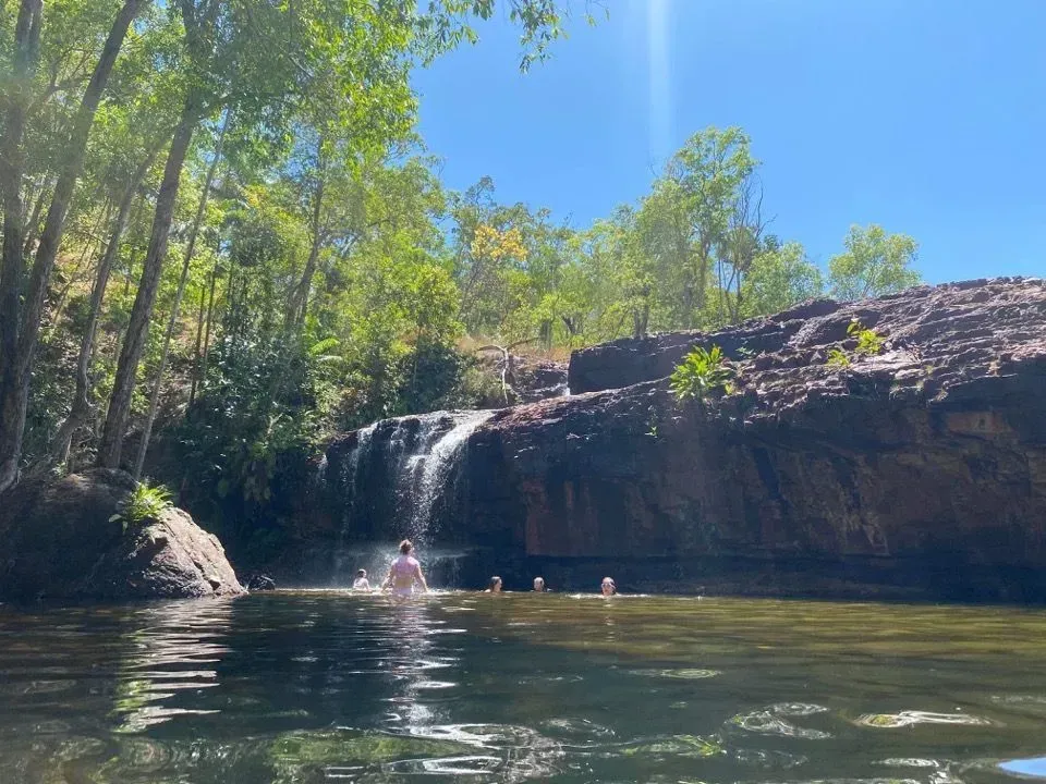 People Swimming in a Waterfall's Cool — Litchfield VIP Tours In Darwin City, NT