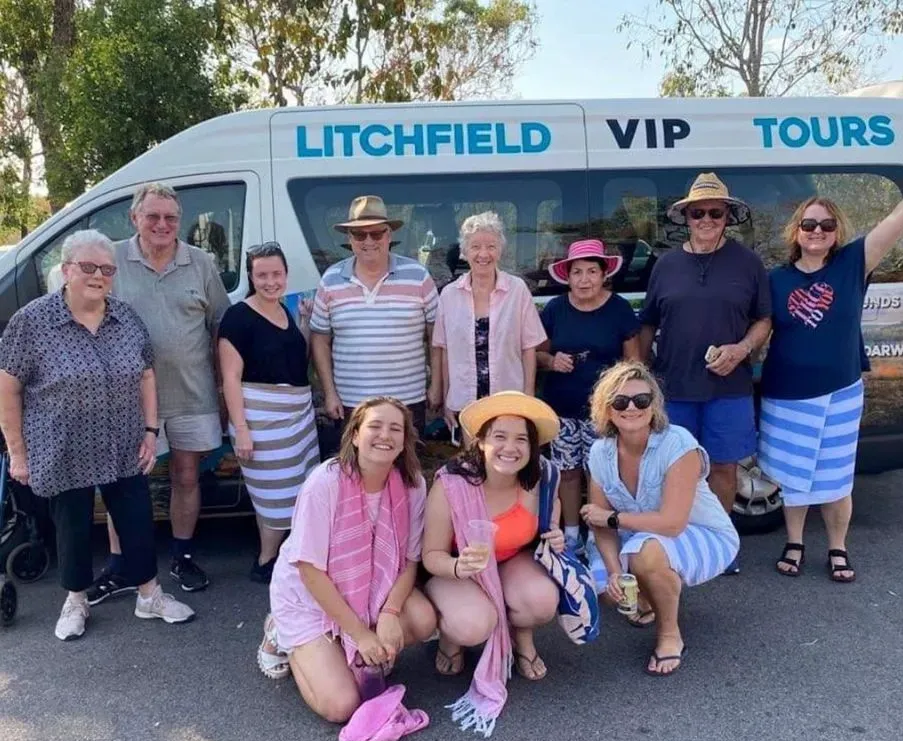 Group of People Pose Next to a Tour Van — Litchfield VIP Tours In Darwin City, NT