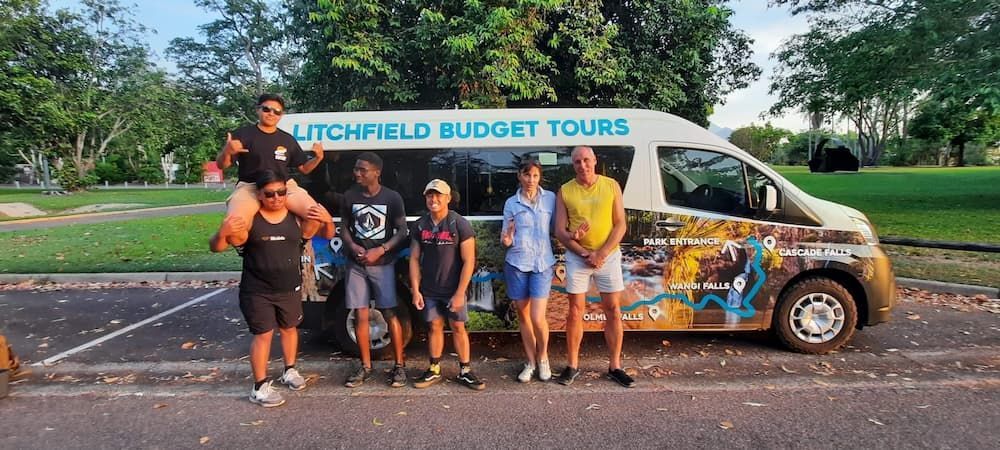 Group of People Standing Next to a Tour Van — Litchfield VIP Tours In Darwin City, NT