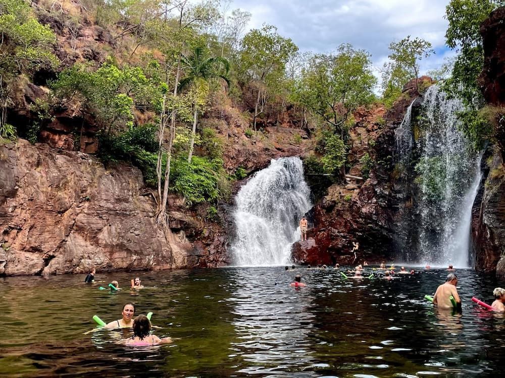 Waterfall Cascading Into a Swimming Hole — Litchfield VIP Tours In Darwin City, NT