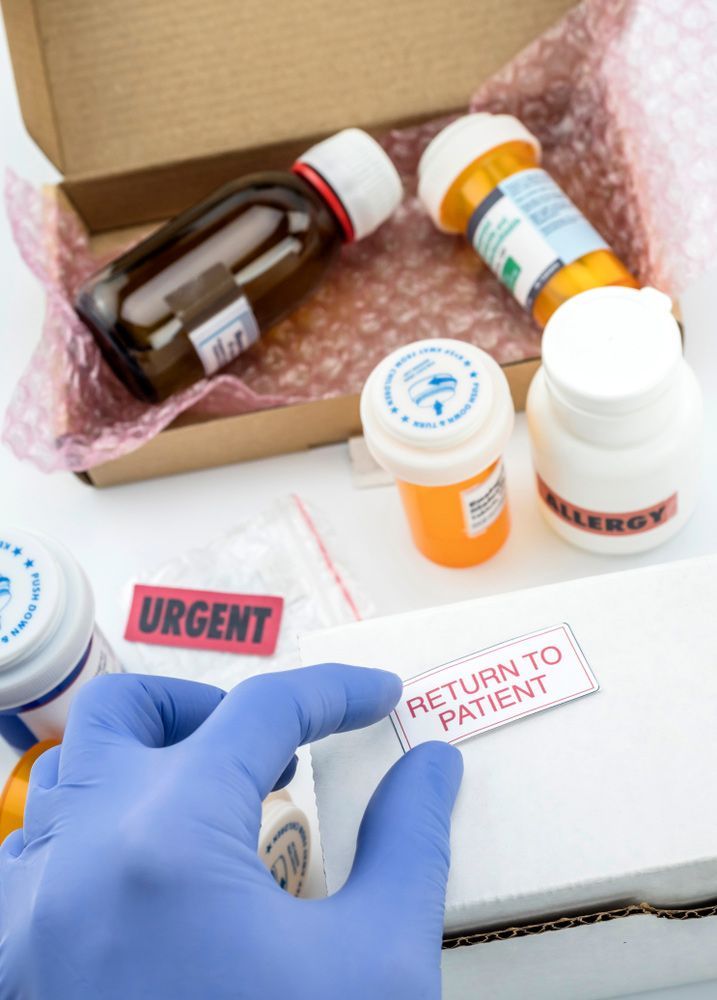 Unpacking Medication In Boxes, Pasting Label Return To The Patient — Return Unwanted Medicines in Wulguru, QLD