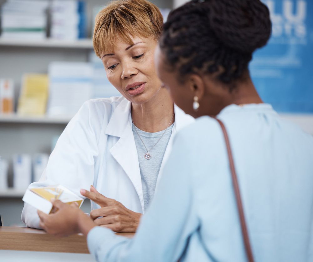 Healthcare, Advice And Black Woman With Pharmacist At Counter For help On Safe Medicine And Prescription Drugs — Return Unwanted Medicines in Wulguru, QLD