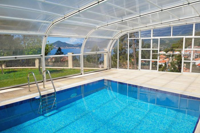 big pool with glass walls
