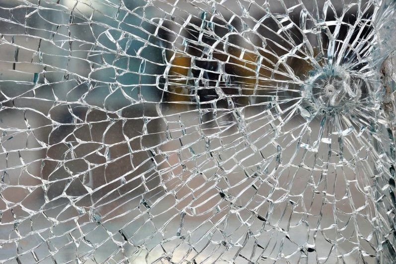 Image of window needing glass repair in Wisconsin Rapids