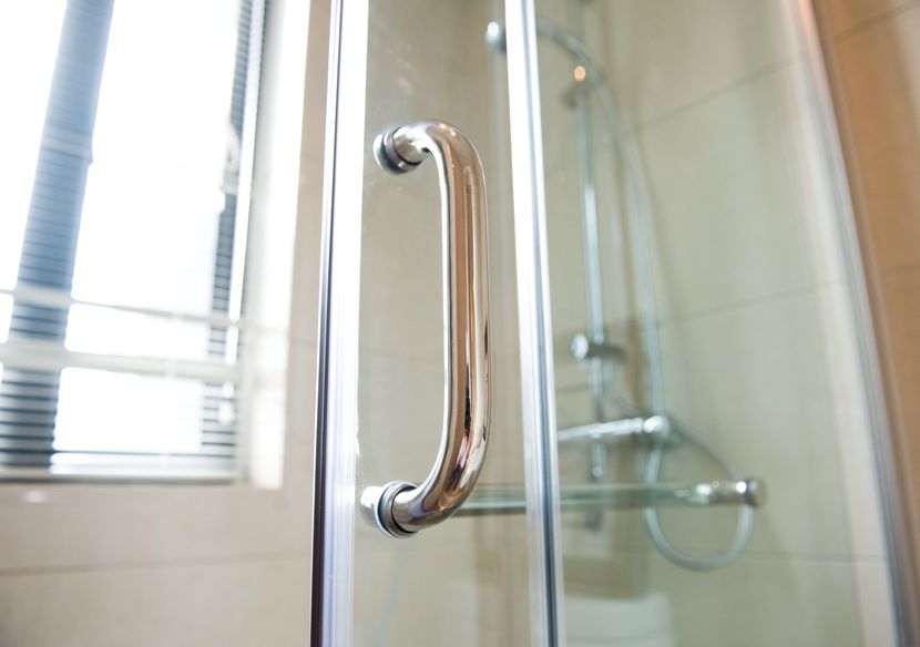 glass shower door with chrome handle