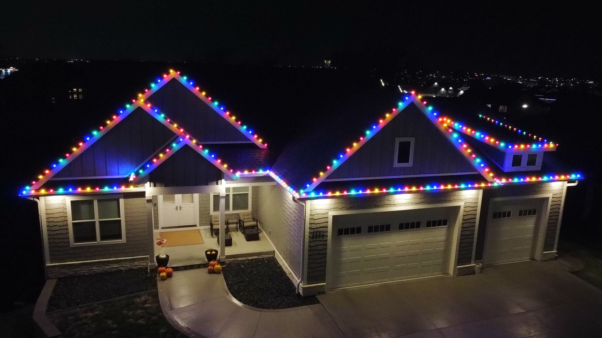 Multi color C9 holiday lights installed on a Central Iowa home by CD’s Lawn Care
