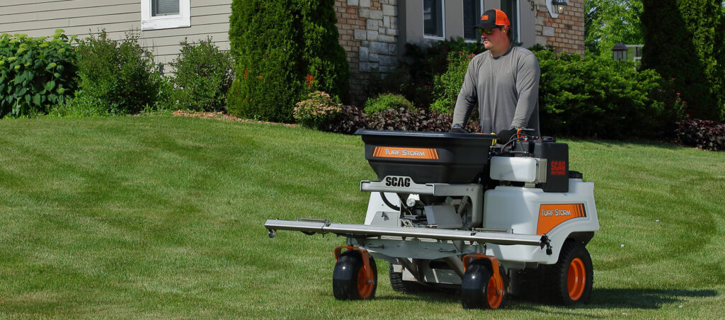 Lawn applicator using Skagg ride-on sprayer for lawn treatments in Central Iowa