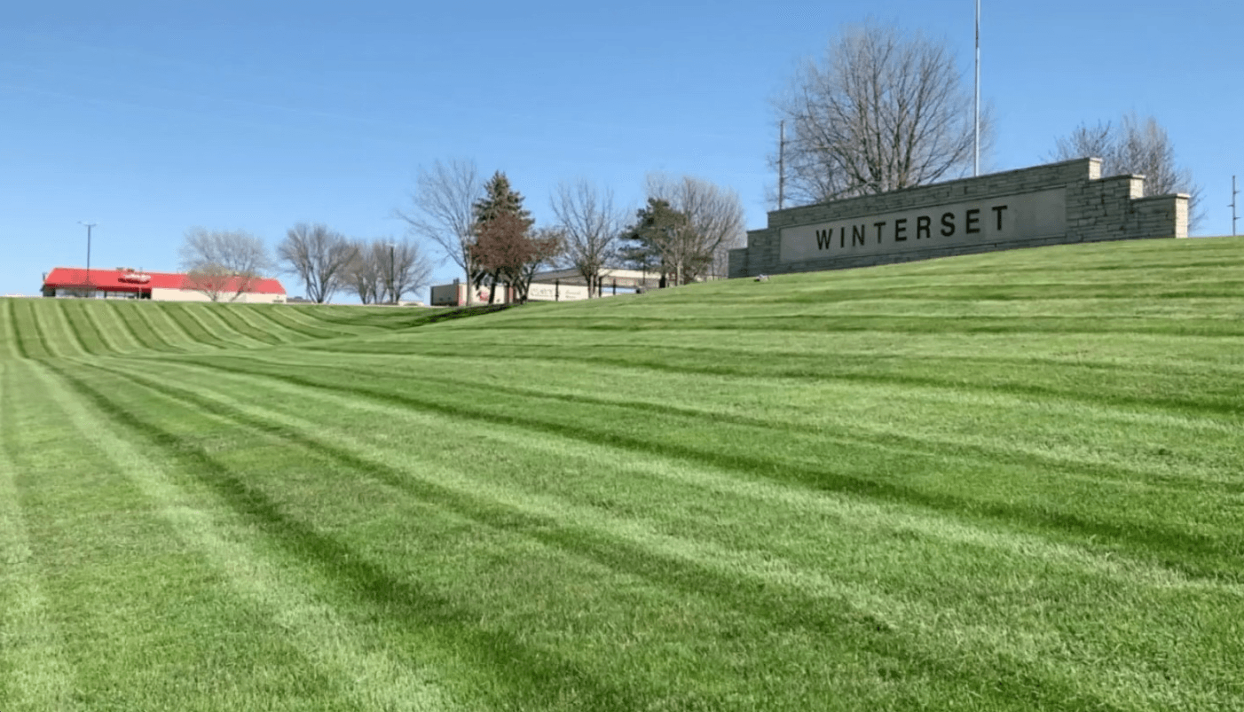 Professional mowing stripes on a commercial lawn maintained by CD’s Lawn Care