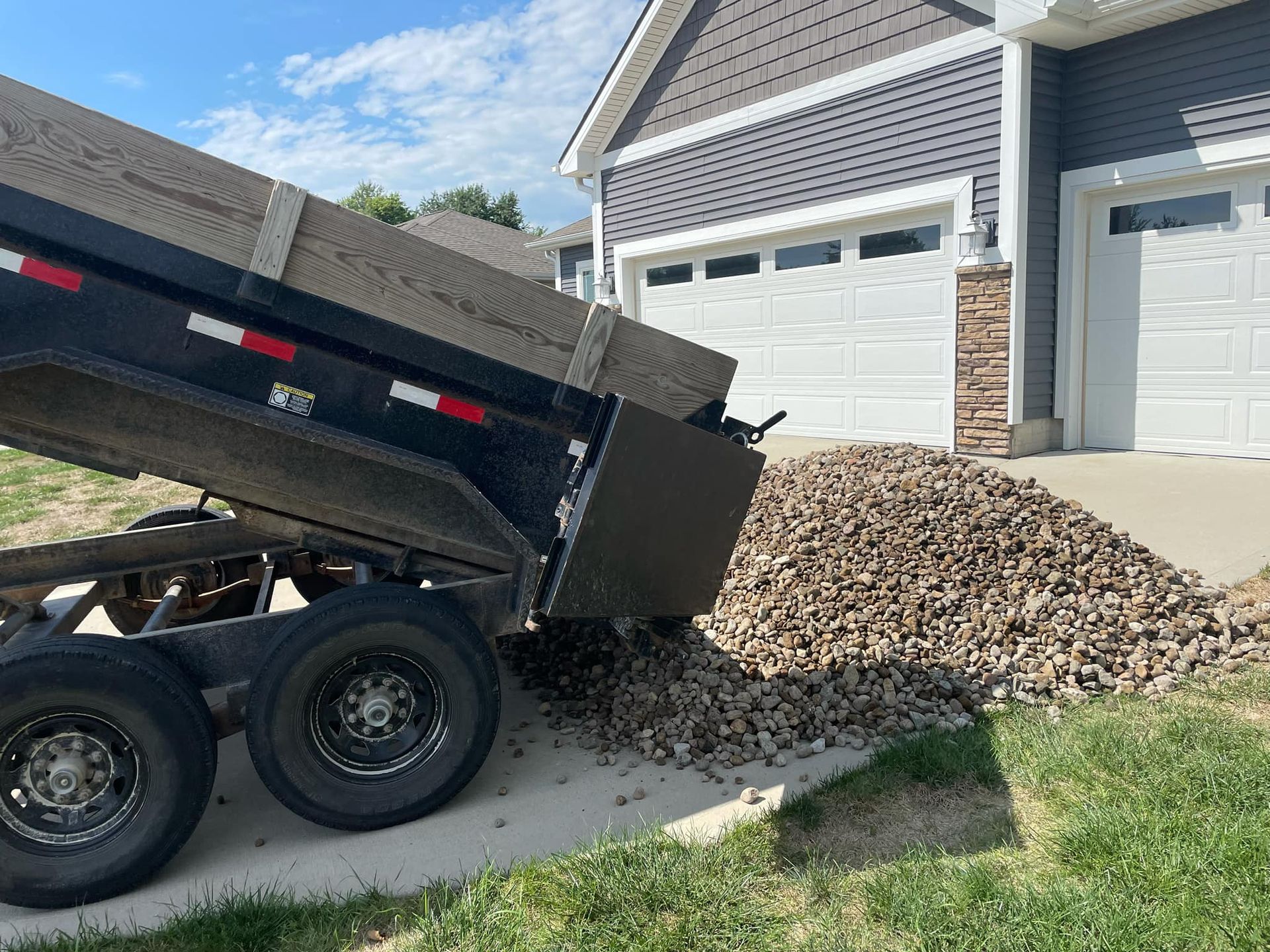 Rock delivery for a Central Iowa DIY landscape project by CD’s Lawn Care