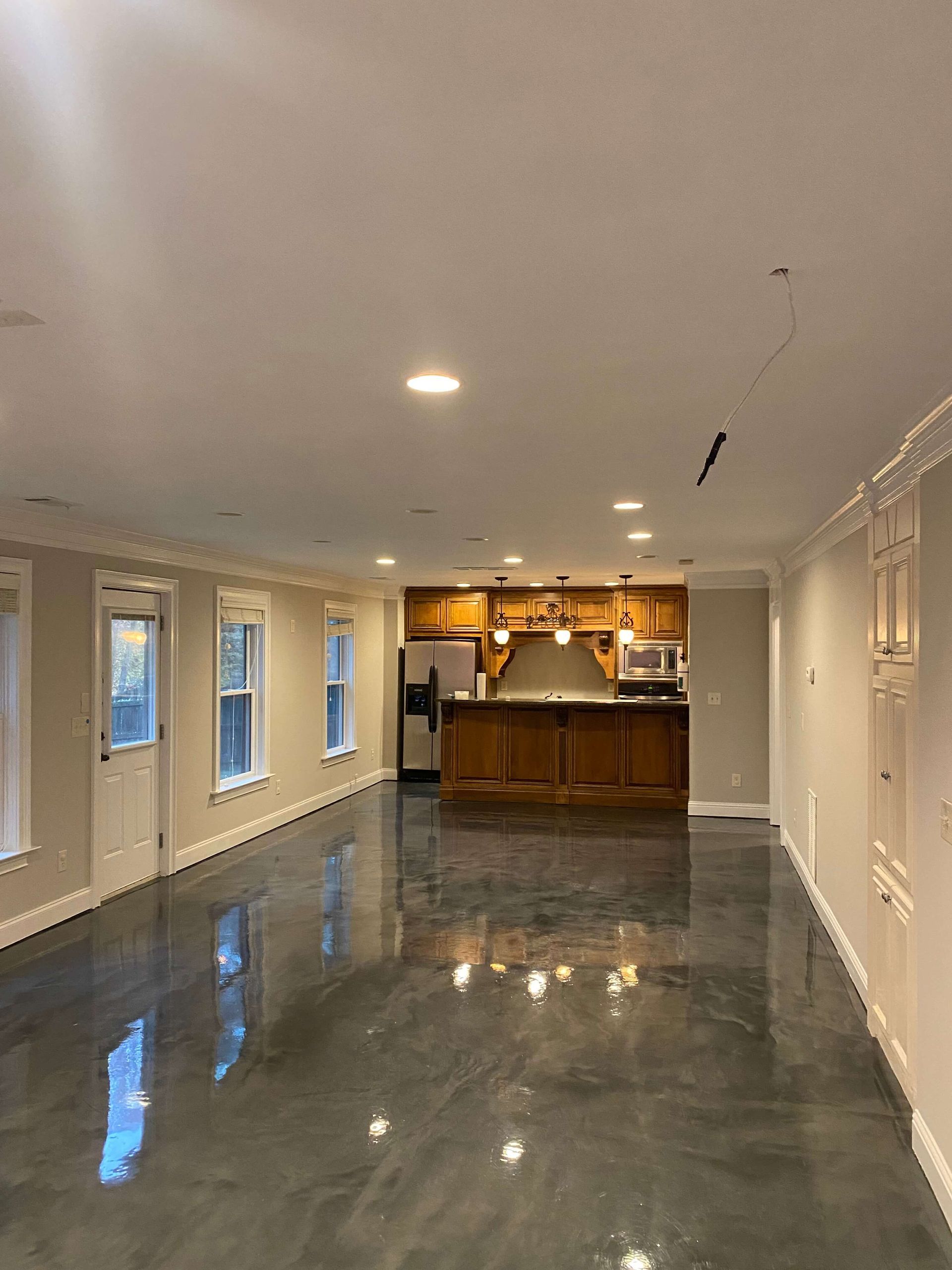 Freshly painted interior wall with clean, smooth finish after professional painting job.