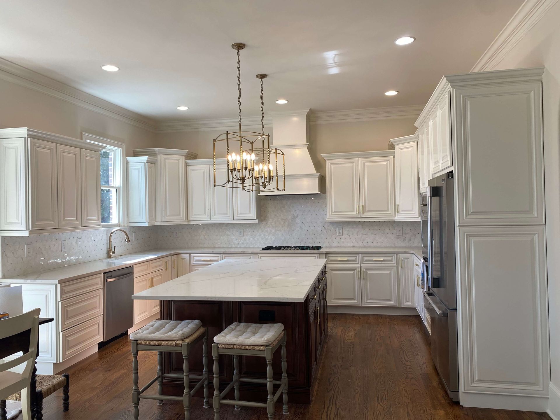 Kitchen cabinets after painting, refreshed with a modern, clean finish.