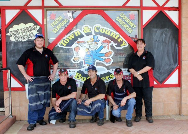 Employees in front of butcher shop in Katherine