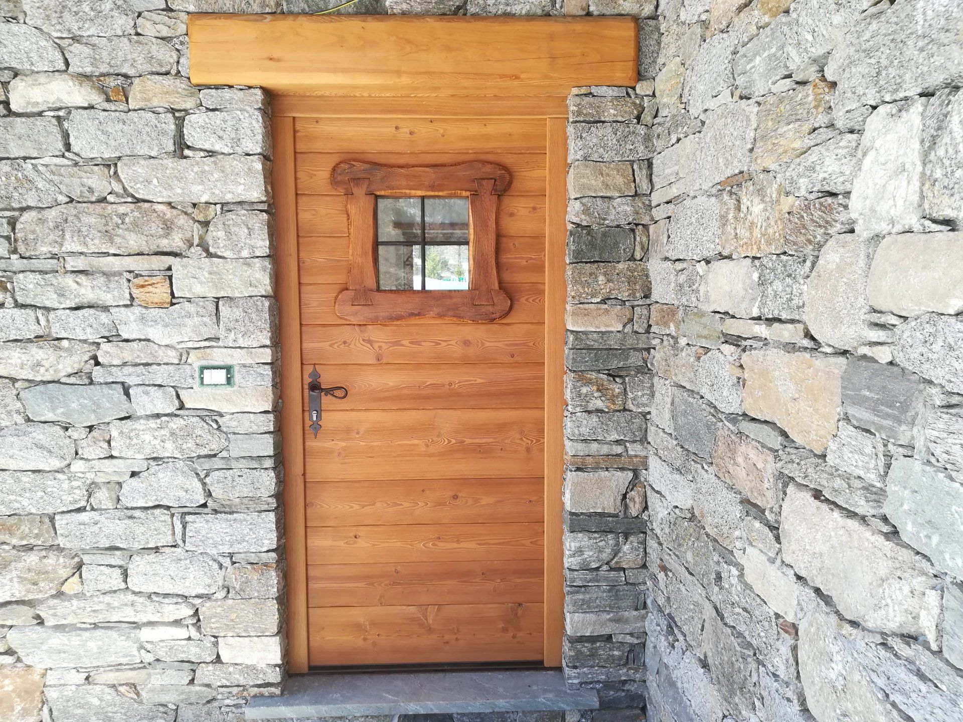 portone ingresso in legno