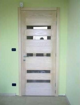 portoni d'ingresso in legno