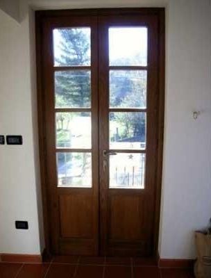 portoni d'ingresso in legno