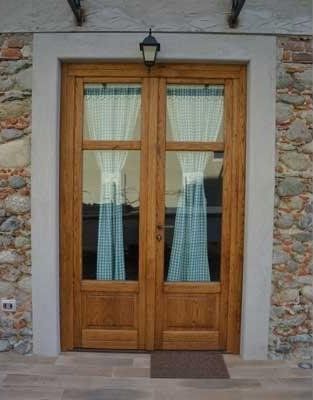 portoni d'ingresso in legno