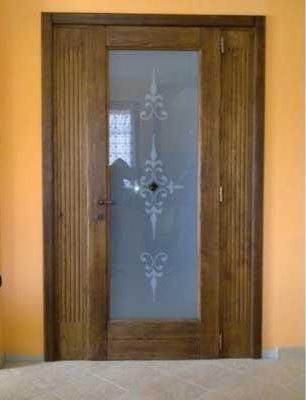 portoni d'ingresso in legno
