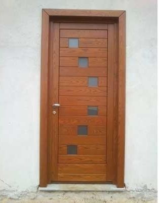 portoni d'ingresso in legno
