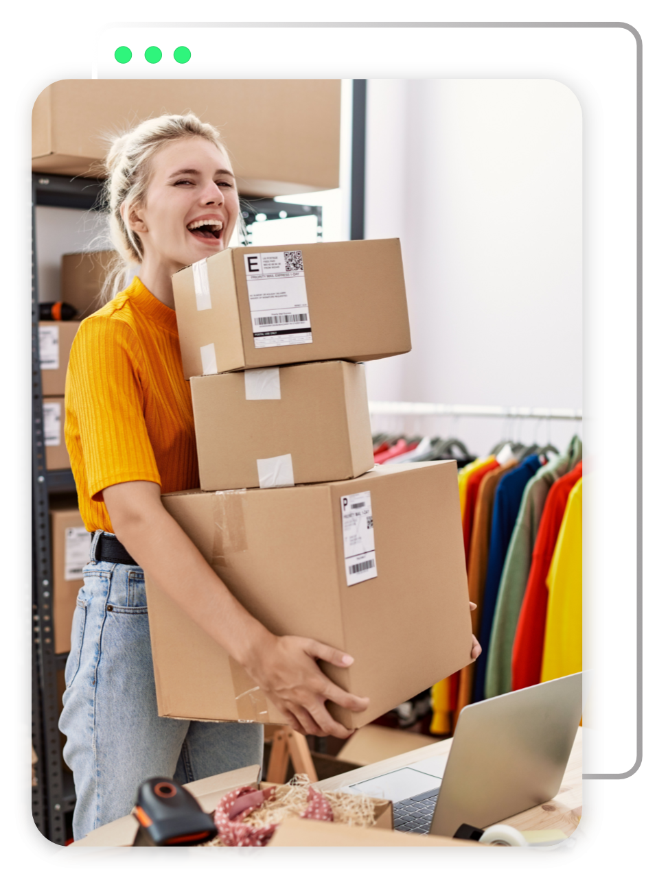 A woman is holding a stack of cardboard boxes.