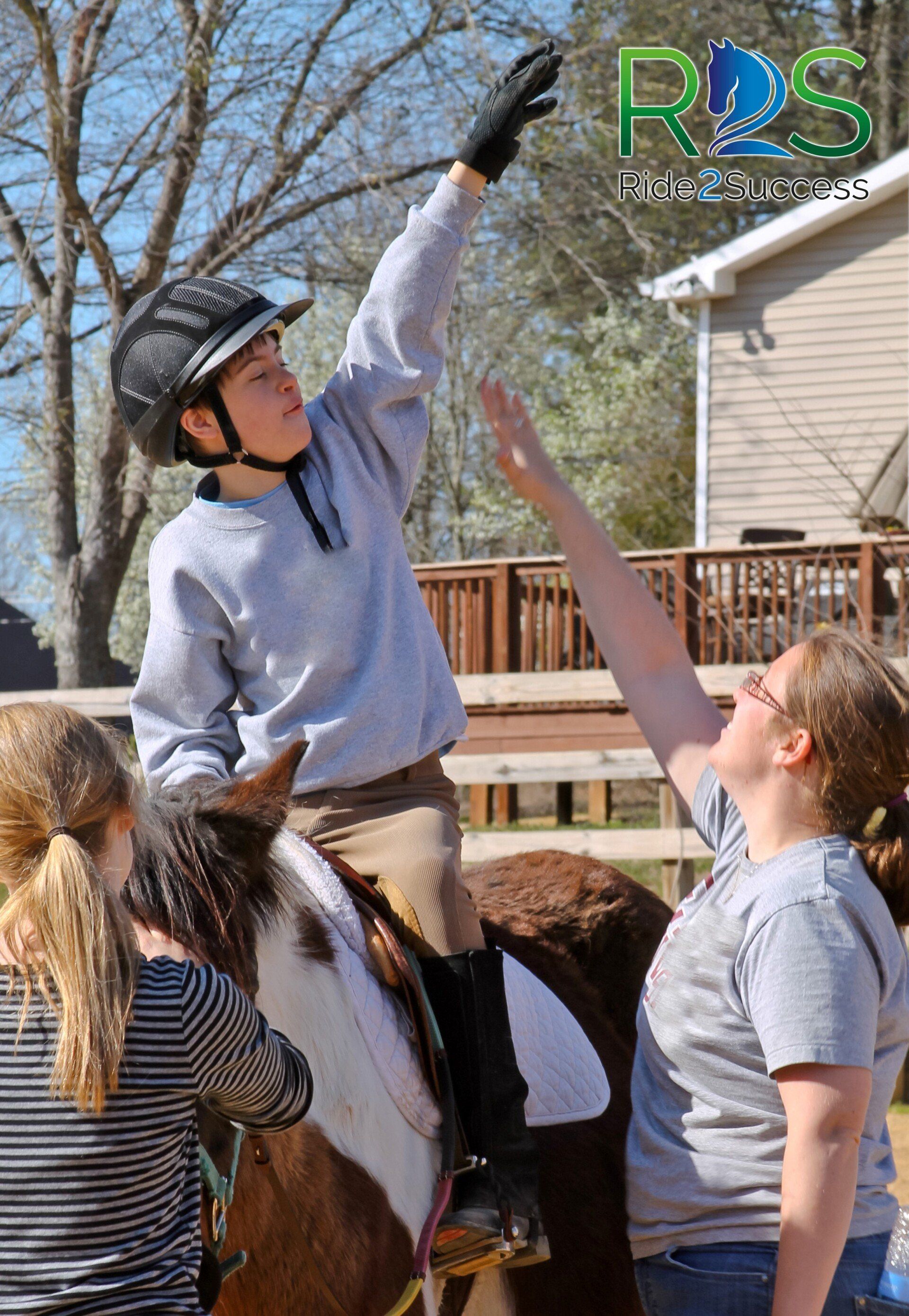 Horseback riders talking in forest