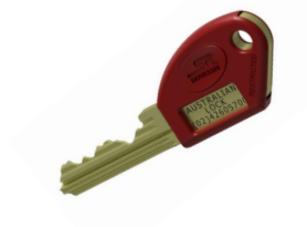 Black keypad lock and handle on a white horizontal-slatted gate with