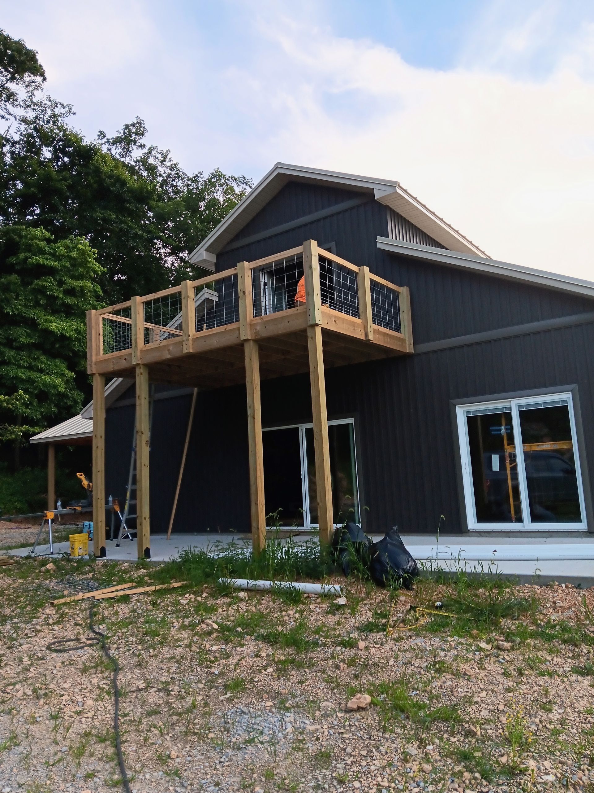 A close up of a roof with a drainpipe on it.