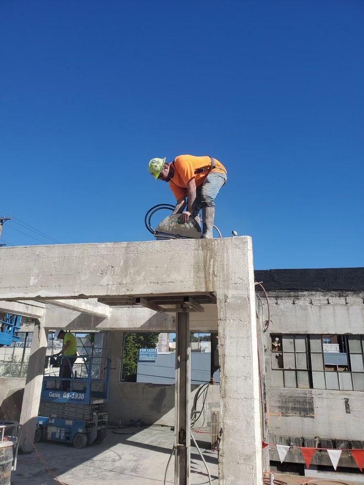 Men working on building framework — Vancouver, WA — Accurate Concrete Cutting