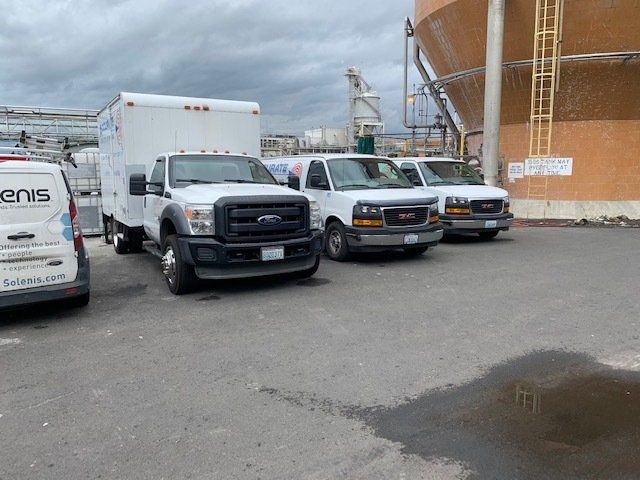 Service vehicles parked — Vancouver, WA — Accurate Concrete Cutting