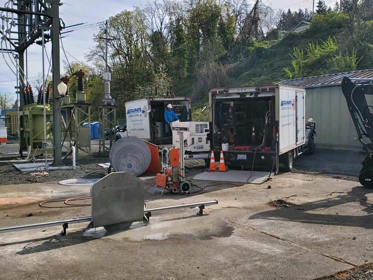Two service vehicles with equipments — Vancouver, WA — Accurate Concrete Cutting