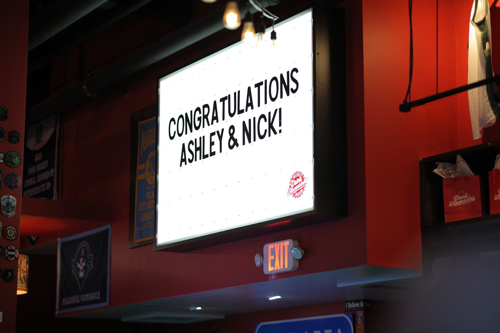 White lighted sign reads 