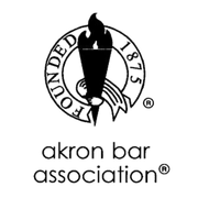 A black and white logo for the akron bar association