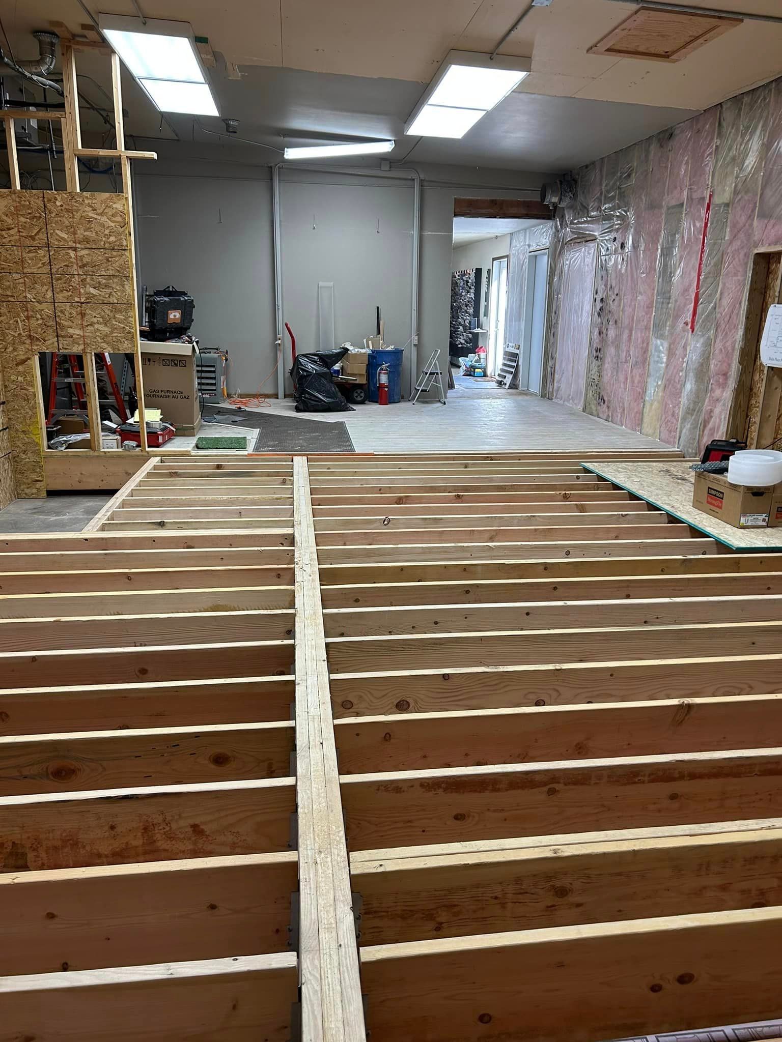 A Wooden Floor Is Being Built In A Room | Park Falls, WI | Park Falls Building