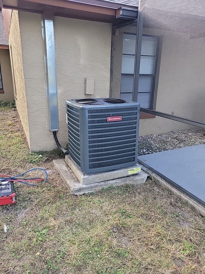 Heat pump installed outside of home by Air Rescue.