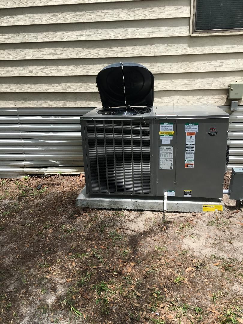 Air Conditioners installed outside a home by Air Rescue.