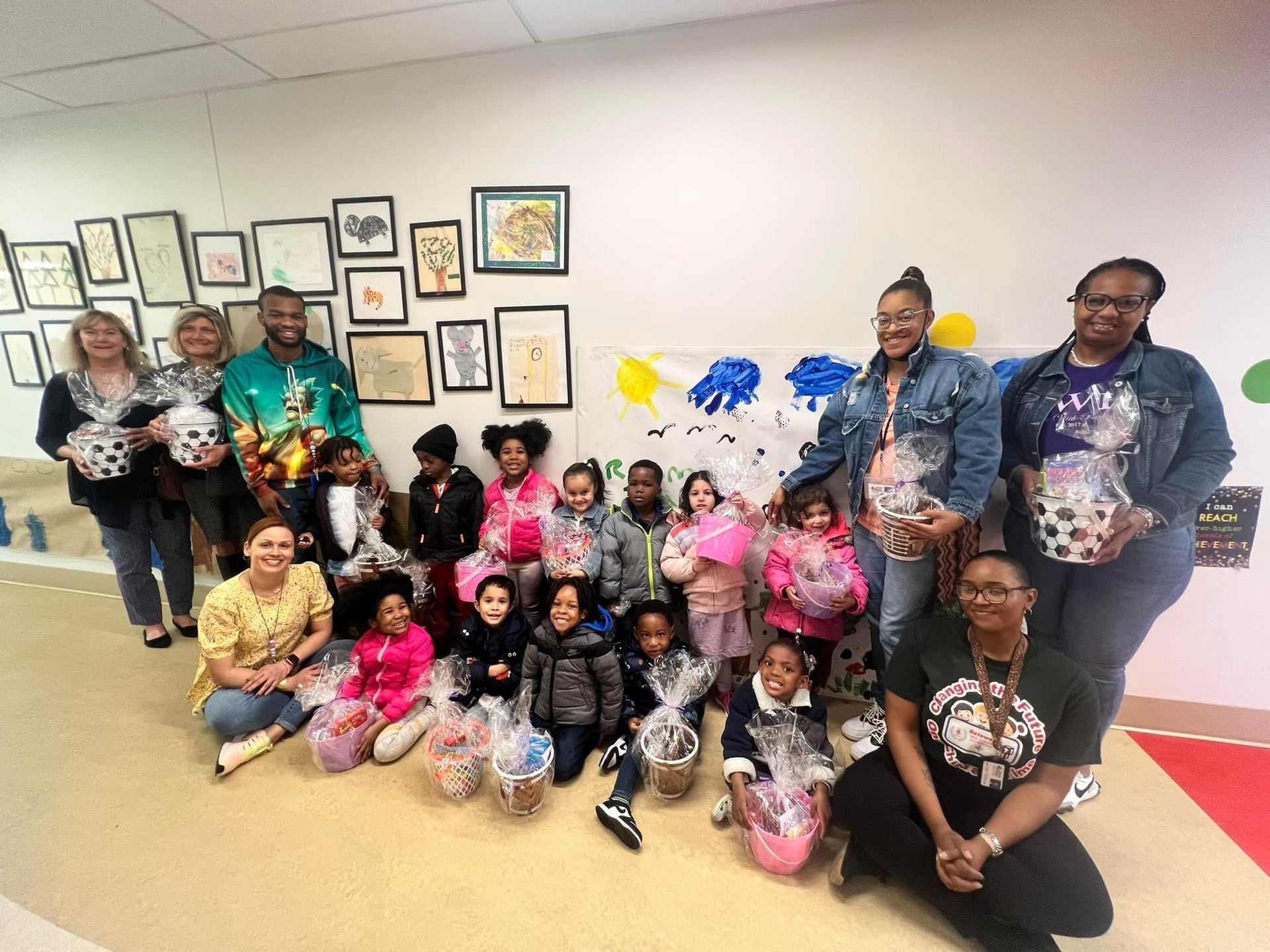 A group of people are posing for a picture in a room.