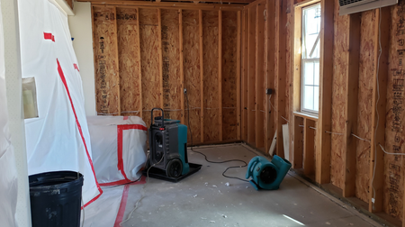 A room with a lot of wooden walls and a window.