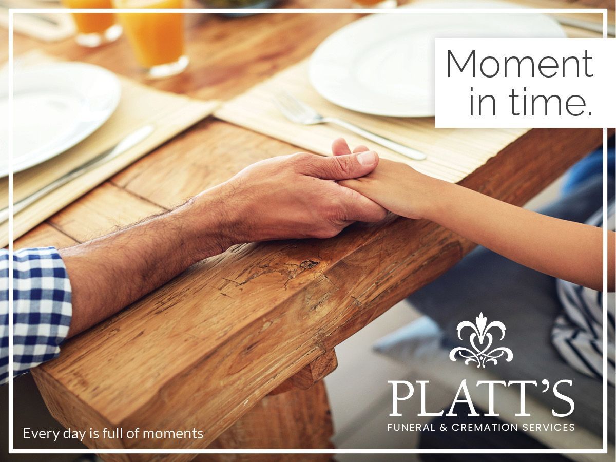 Hands clasped at a wooden table, plates set, drinks visible. Platt's Funeral Services logo with 