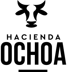 A black and white logo of a cow with horns and the words hacienda ochoa.