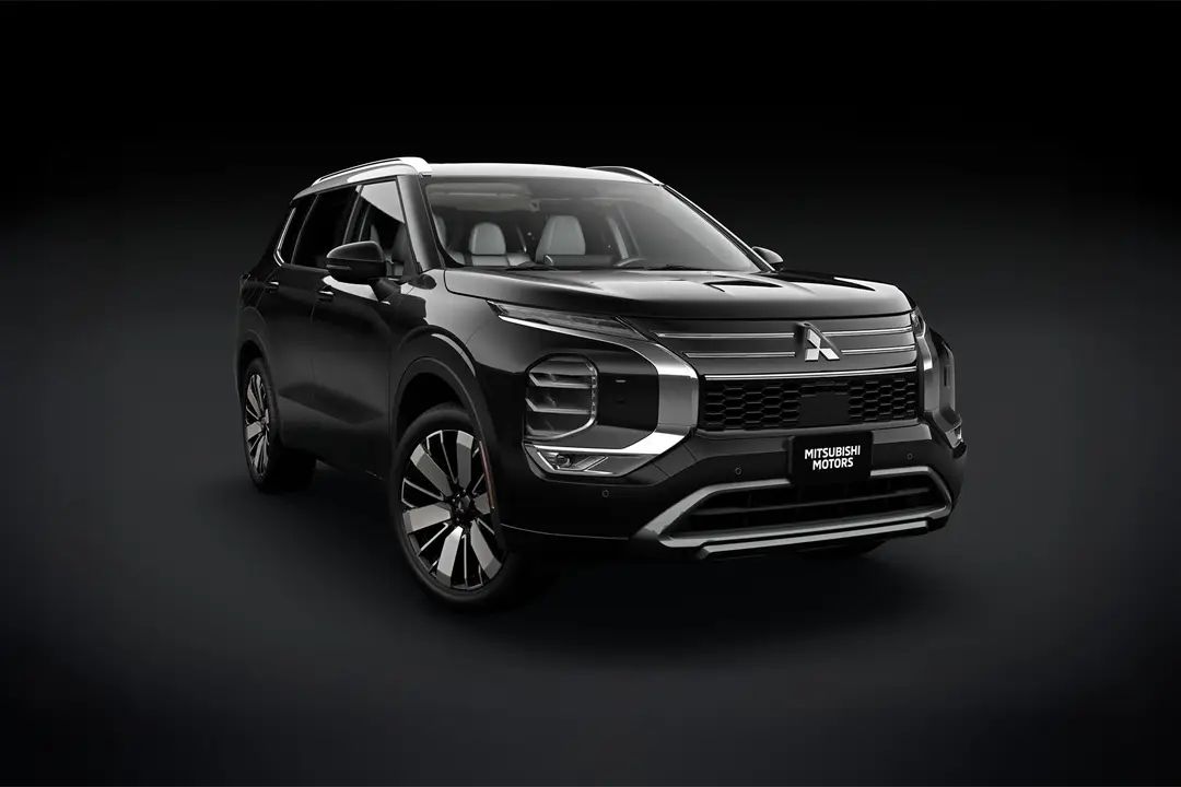 A black suv is parked on a black background.