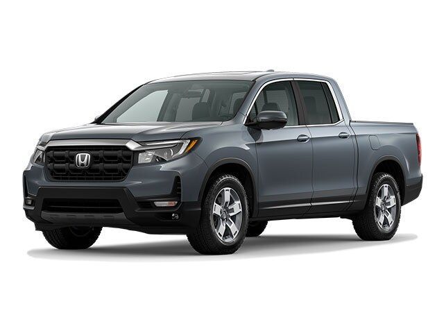 A gray honda ridgeline pickup truck is shown on a white background.