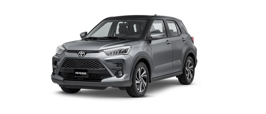 A gray toyota raize is shown on a white background.