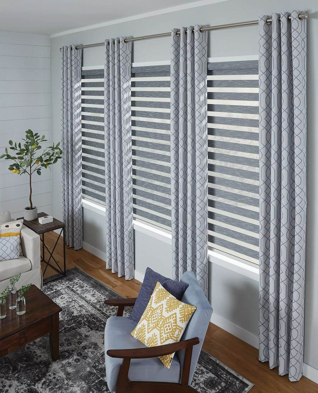 A Room with Window Blinds and Draperies