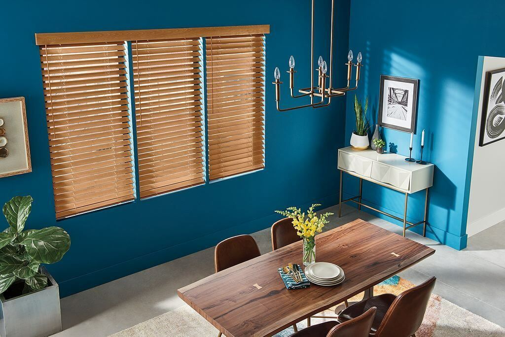 Dining Area With Blue Walls & Wood Blinds