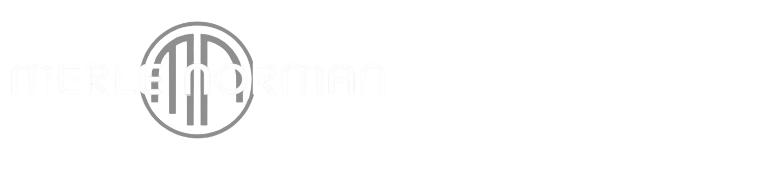 Logo of two stylized letters, possibly 