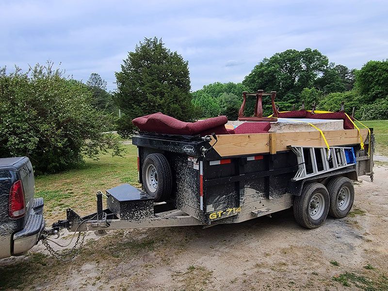 Trailer full of furniture, furniture removal and recycling