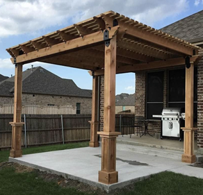 Wooden pergola over a patio with a grill, backyard setting, brown wood.
